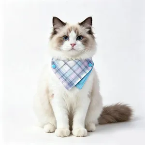 Pet bib detail, double-sided plaid cat scarf with blue snaps, comfortable pet accessory.