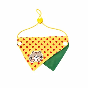 Reversible pet bandana with cat embroidery, yellow dot and green fabric for cute cats.
