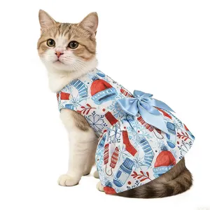 Cute Christmas pet dress for cats and dogs, featuring festive winter prints and a soft bow.
