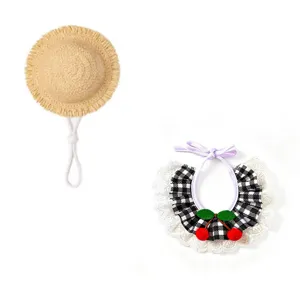 Cute pet straw hat and cherry lace bib set, perfect summer accessories for dogs and cats.