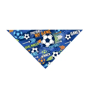 Close-up detail of the soccer theme pet bandana fabric, showing vivid football and text print.