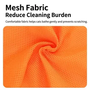 Breathable orange mesh fabric close-up for pet cat bathing and grooming bag design.