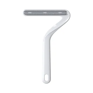 Pet double-sided hair remover brush, lint scraper tool for dogs and cats fur cleaning.