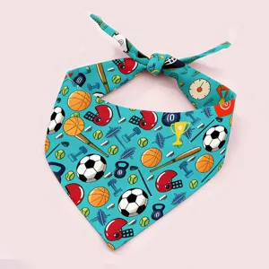 Pet sports theme triangle scarf detail view showing colorful football basketball patterns and tied knot.