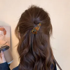 Acetate blue brown triangle hair clip comb for women elegant hair styling tool detailed view