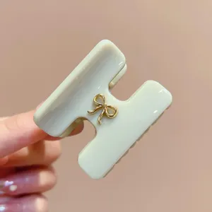 Molla per capelli in acetato a forma di H stile coreano, elegante fiocco dorato.