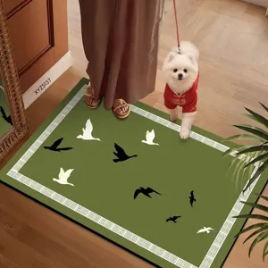 Detailed view of the green floor mat featuring flying birds pattern and retro border design.