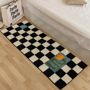Black and white checkerboard bedside rug detail, fluffy imitation cashmere texture.