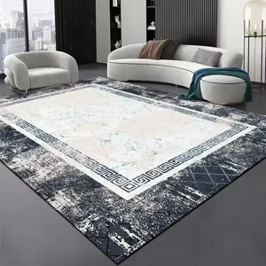 Modern minimalist grey living room carpet with geometric border, durable floor rug for home.