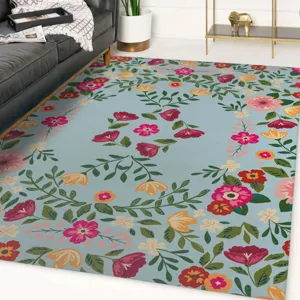 Nordischer Blumenteppich Detailansicht mit blauem Hintergrund und buntem Blumenmuster.