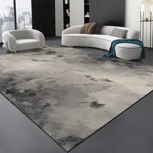 Détail de tapis abstrait style encre noir et blanc dans un salon moderne luxueux.
