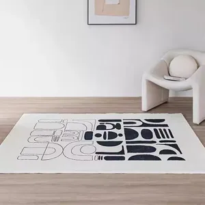 Modern black and white geometric faux cashmere large area rug for living room and bedroom decor.