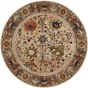 Gros plan d'un tapis rond bohème orné de superbes motifs floraux vintage complexes.