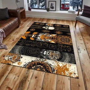 Detailed view of the luxury black and gold pattern area rug set in a modern living room.