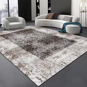 Modern minimalist grey living room area rug, wear-resistant decorative carpet detail.