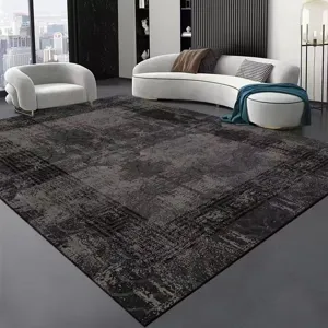 Modern dark gray living room rug scene detail showcasing textured pattern and elegant interior decor.