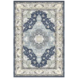 Vintage Persian bohemian style area rug detailed view, classic blue medallion pattern floor mat.