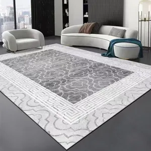 Modern minimalist grey living room area rug with geometric pattern for home decor.