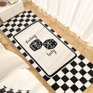 Black and white checkered rug with dice design, soft plush floor mat for bedroom.