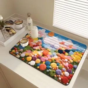 Close-up detail of the 3D floral absorbent drying mat placed on a clean kitchen countertop.