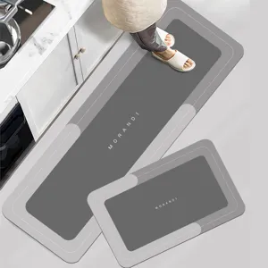 Kitchen floor mat detail showing diatomite absorbent surface and anti-slip backing structure.