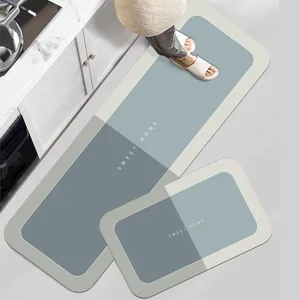 Diatomite kitchen floor mat 2-piece set, absorbent and non-slip geometric design.