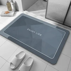 Détail de tapis de bain en terre de diatomée souple, antidérapant et absorbant.