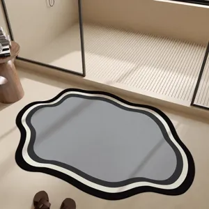 Non-slip diatomaceous earth bath mat with modern irregular cloud wave design for home use.
