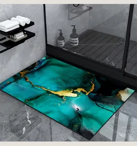 Absorbent diatomaceous earth bath mat with modern teal and gold fluid art design for bathroom.