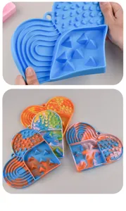 Silicone pet slow feeder mat for cats and dogs, heart shaped slow feeding bowl with suction cups.