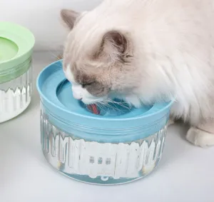 Clear pet water bowl detail showing cat drinking safely without wetting its mouth.