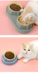 Pet double bowl detail view, cat feeding and eating dry food, anti-tipping plastic feeder.