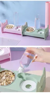 Detailed view of double pet bowl with automatic water bottle feeder, cat ear design bowl for cats.