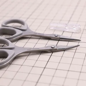 Mini detail craft scissors with gray handles and stainless steel blades, straight and curved.