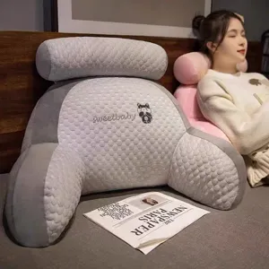Ergonomic bed rest reading pillow with latex lumbar support for comfortable lounging in bed.