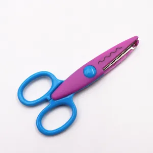 Detail view of the pink and blue craft lace scissors, 13cm size for clay craft work.