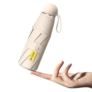 Parapluie capsule mini compact 5 plis, protection UV parapluie pliable portable pour femmes.