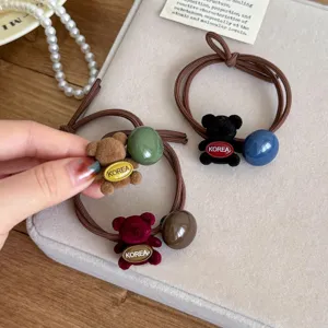Chouchous mignons en forme d'ours pour femmes, élastiques bruns avec perles colorées.