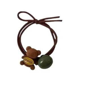 Élastique à cheveux mignon ours pour femmes, attache cheveux élastique durable avec charme.