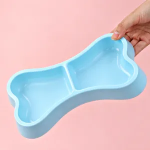 Doppia ciotola per animali blu a forma di osso, grazioso design a due scomparti per cani e gatti.