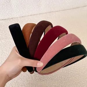 Set of velvet wide headbands in assorted colors. Soft fabric hair hoops for daily wear and styling.