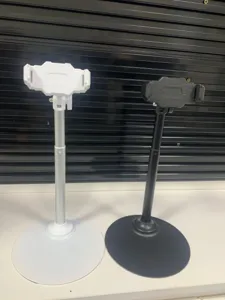 Detail view of adjustable metal phone stand for desk, live streaming and video recording.