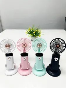 Vista dettagliata del mini ventilatore da scrivania portatile con diverse opzioni di colore e design.