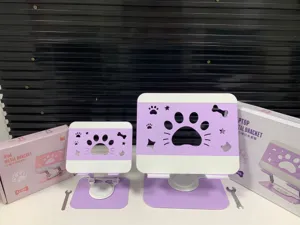 Metal laptop and tablet stand detail, cute cat paw hollow design, stable rotating base.