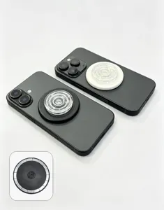 Detail view of the transparent MagSafe magnetic phone grip showing the internal magnetic ring.