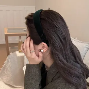 Dark green velvet headband detail, chic wide hair hoop for daily fashion styling.