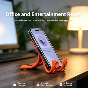Flexible silicone phone stand with suction cups for desktop office and entertainment use.