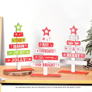 Wooden DIY mini Christmas tree table ornament with English letters for holiday office decor.