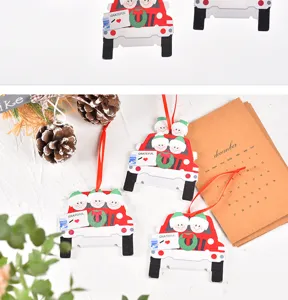 Christmas wooden car hanging ornament detail, cute family DIY pendant for holiday tree decoration.