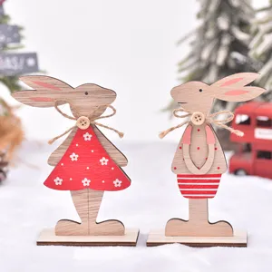 Cute Easter wooden rabbit couple ornaments desktop decor with red dress and twine bow.